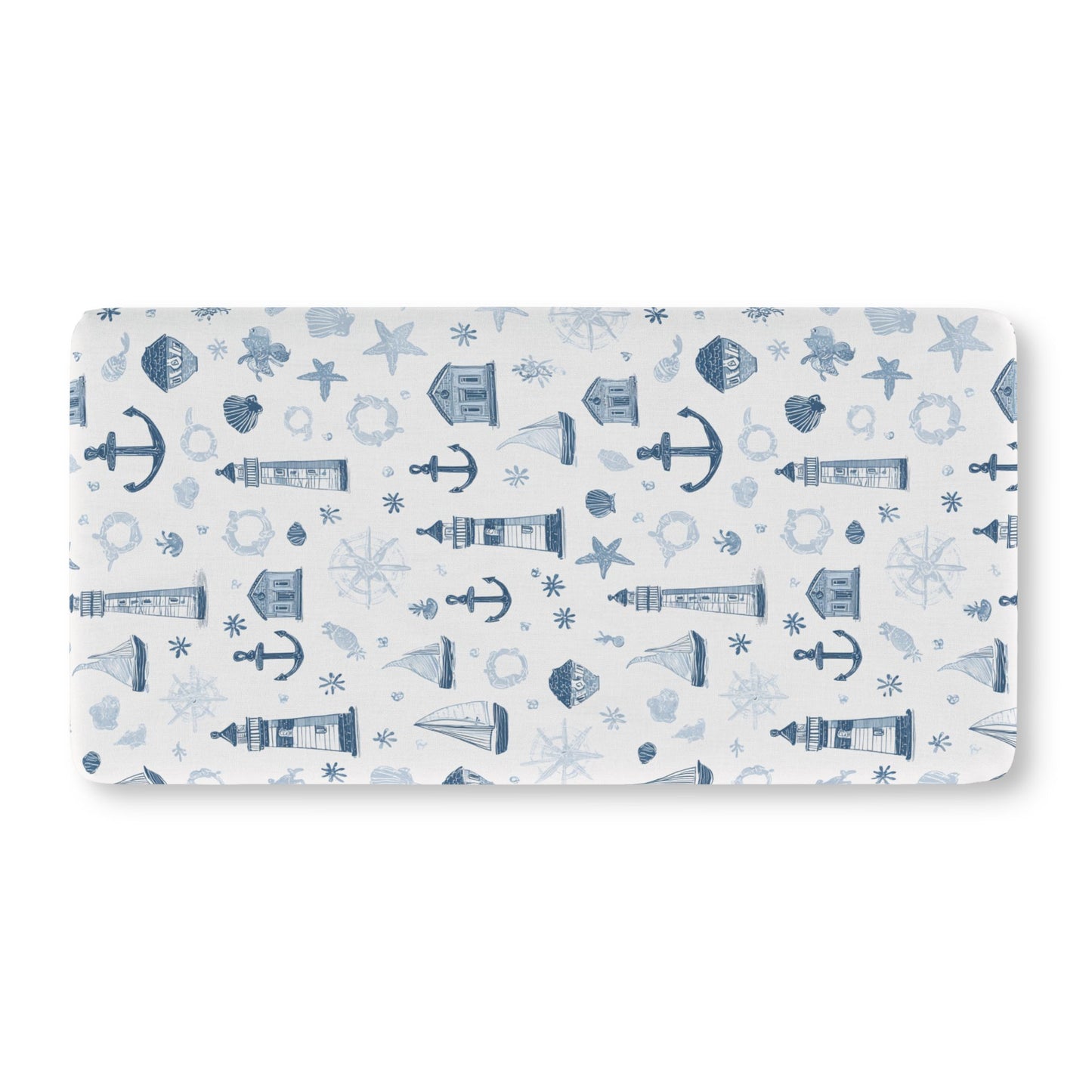 Navy nautical crib sheet showing the fitted elasticated corner
