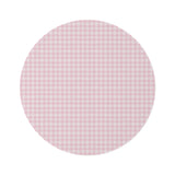Blush Gingham round nursery rug on a baby room floor