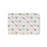 Boho Botanical fitted crib sheet on a nursery crib mattress