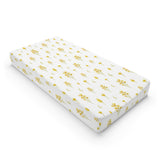 Golden Meadow changing pad cover on a nursery changing table