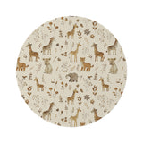 Golden Savanna round nursery rug on a baby room floor