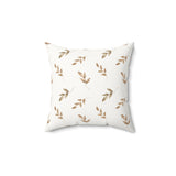 Linen Leaf decorative nursery pillow on a glider chair