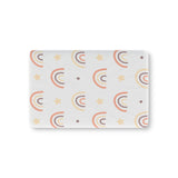 Peach Rainbow fitted crib sheet on a nursery crib mattress