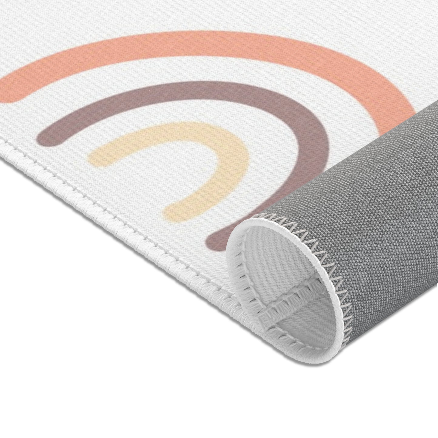Peach Rainbow nursery area rug for a baby room floor