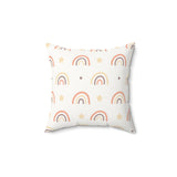 Peach Rainbow decorative nursery pillow on a glider chair