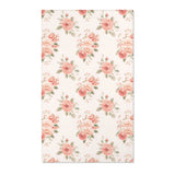 Blush floral nursery area rug with rose bouquets on off-white