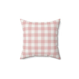 Rose Gingham decorative nursery pillow on a glider chair