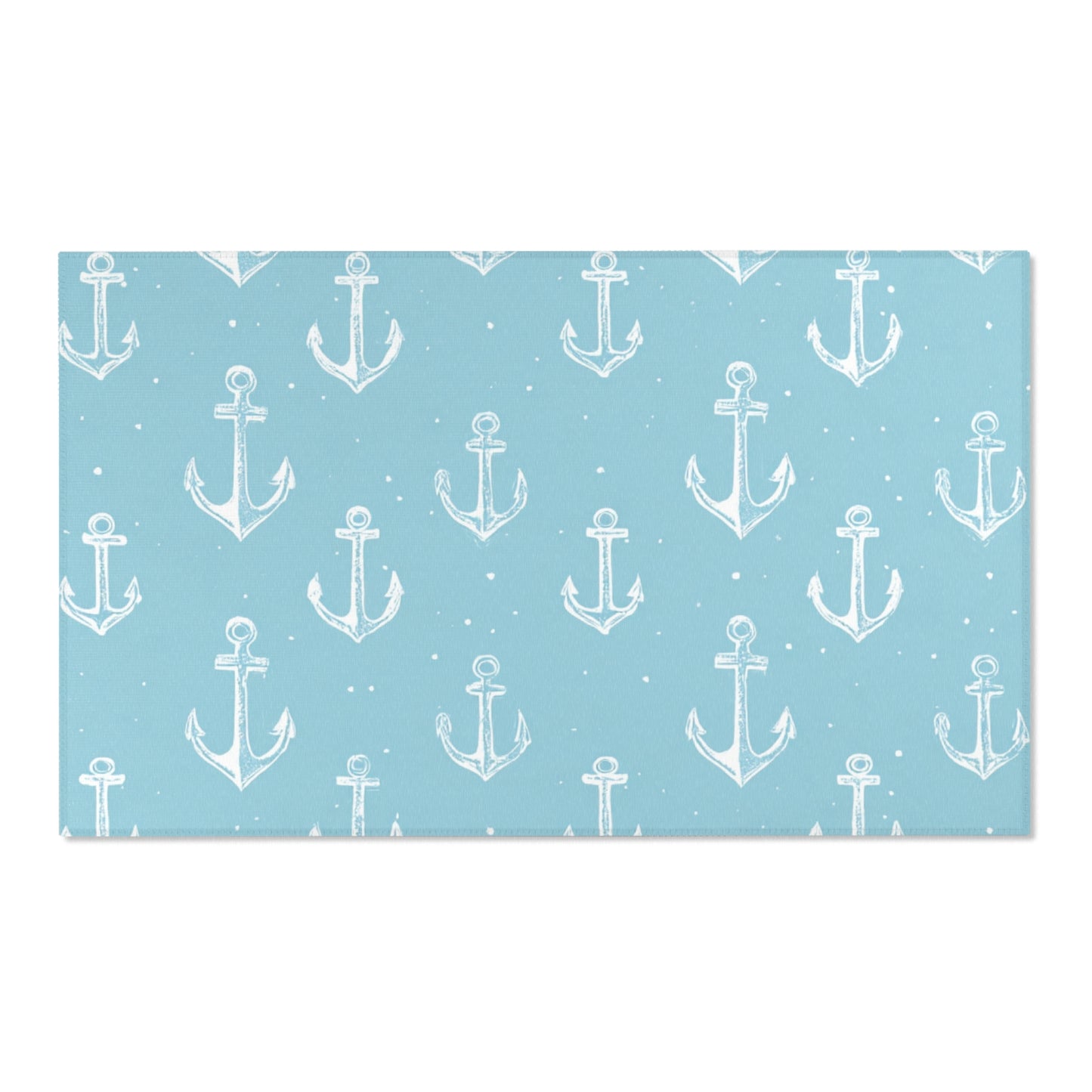 Teal anchor area rug defining a nursery play area