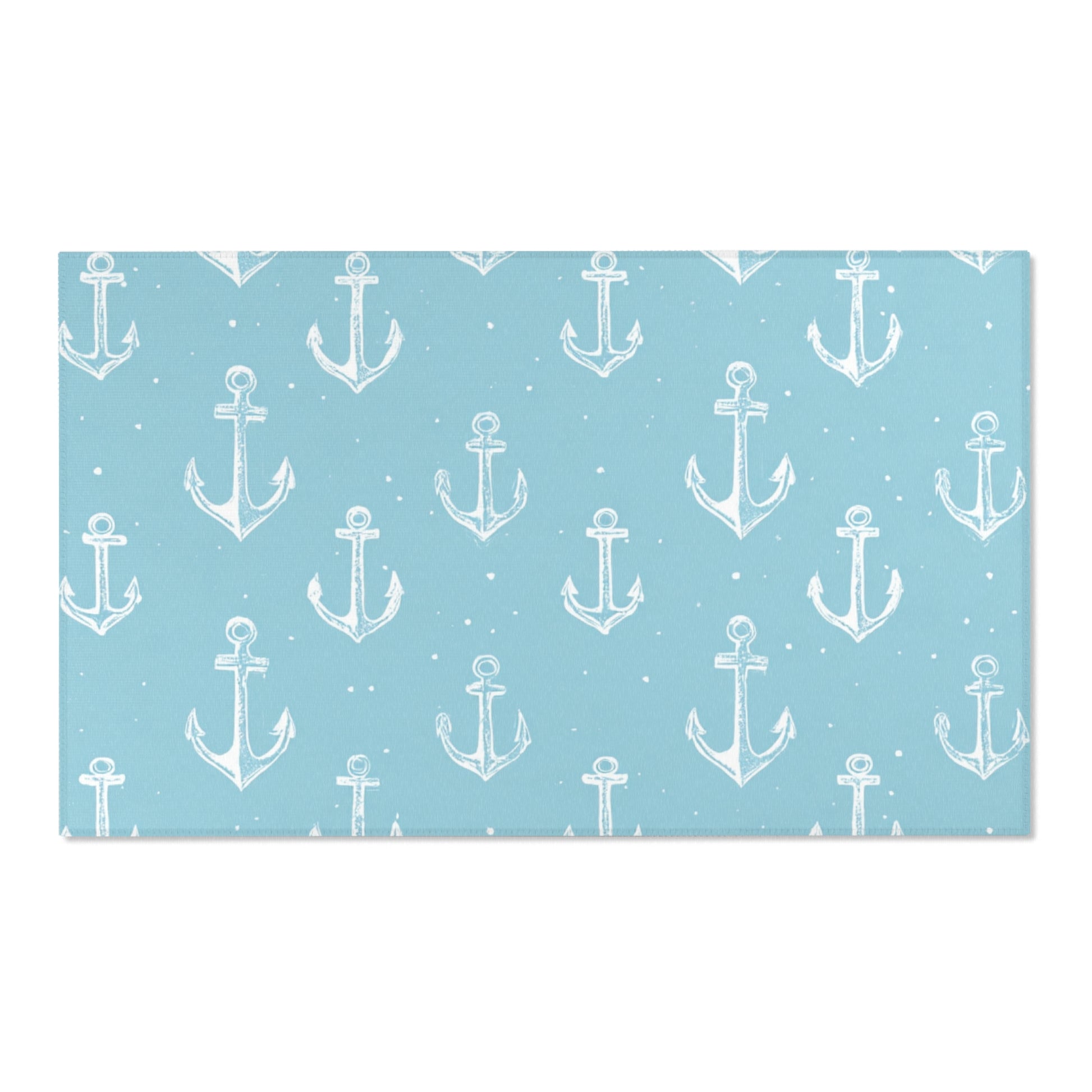 Teal anchor area rug defining a nursery play area