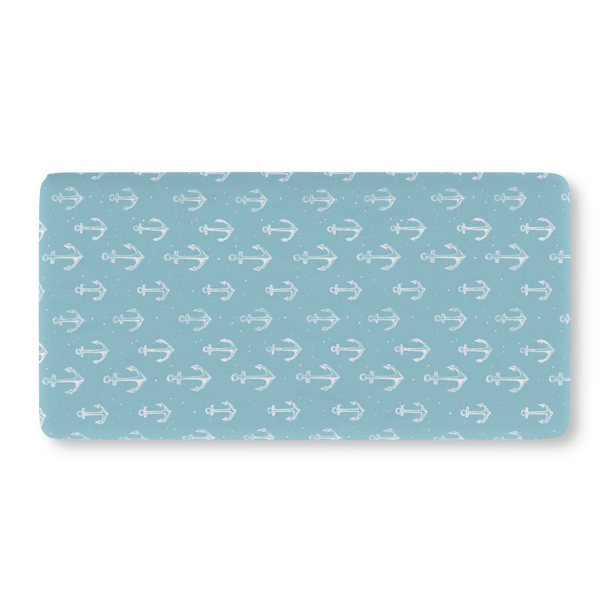 Teal anchor crib sheet showing the fitted elasticated corner