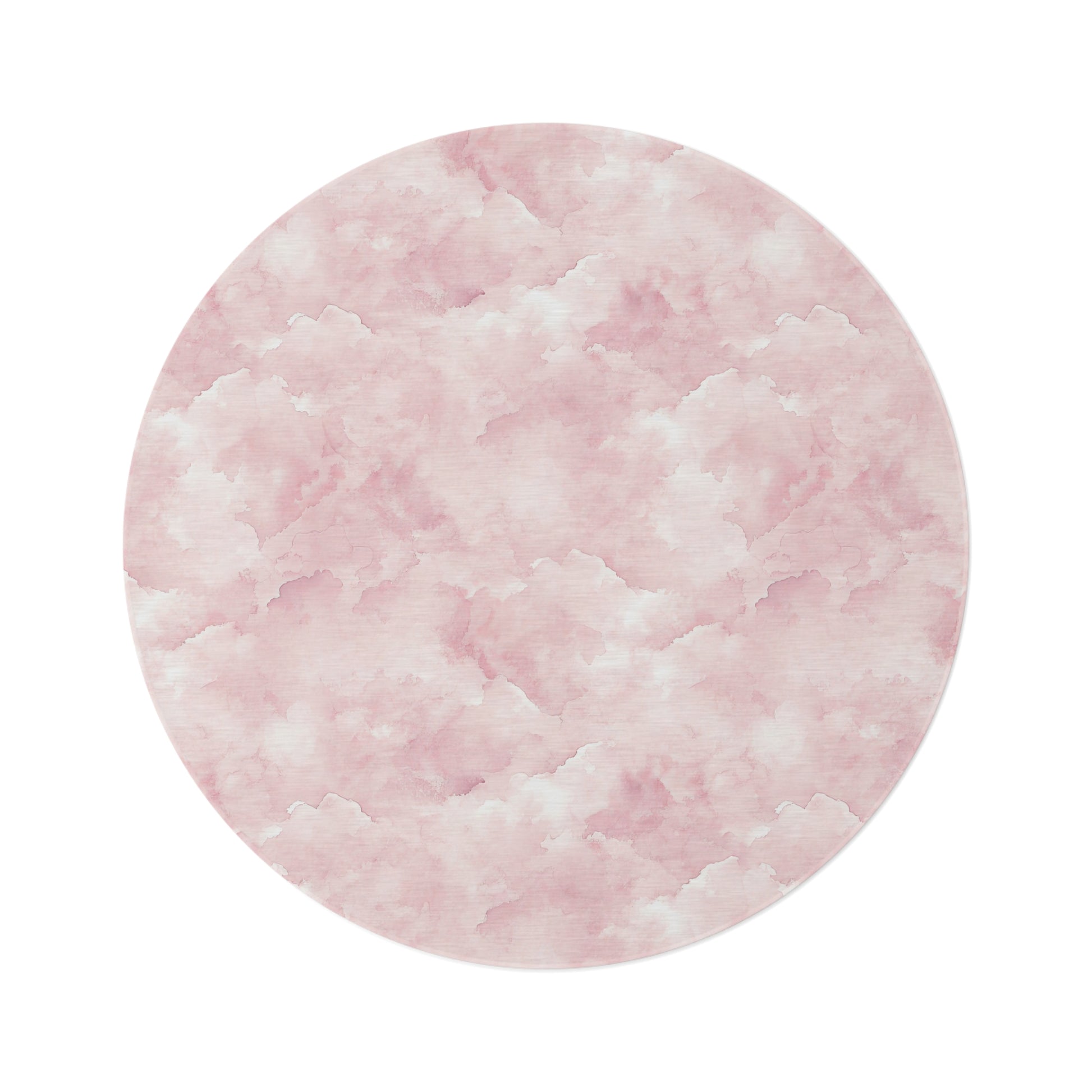 Pink watercolor clouds round nursery rug on a baby girl's bedroom floor