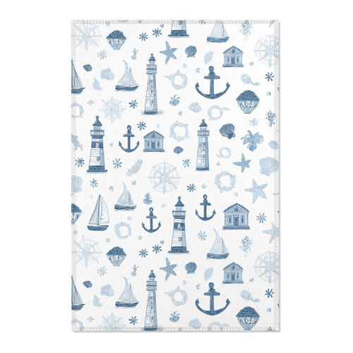 Nautical nursery area rug in a baby boy bedroom