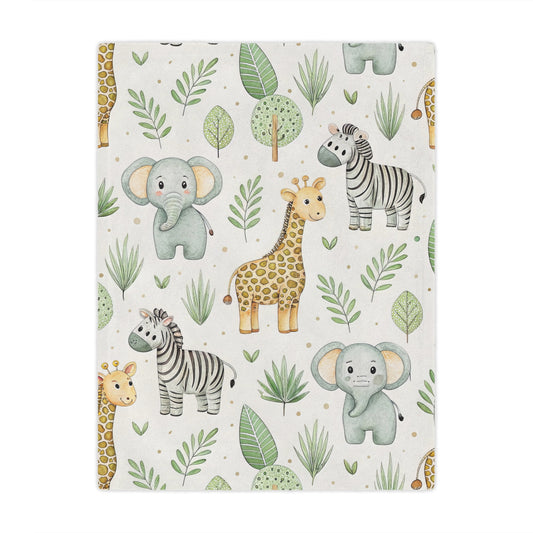 Safari animal minky baby blanket draped over a crib