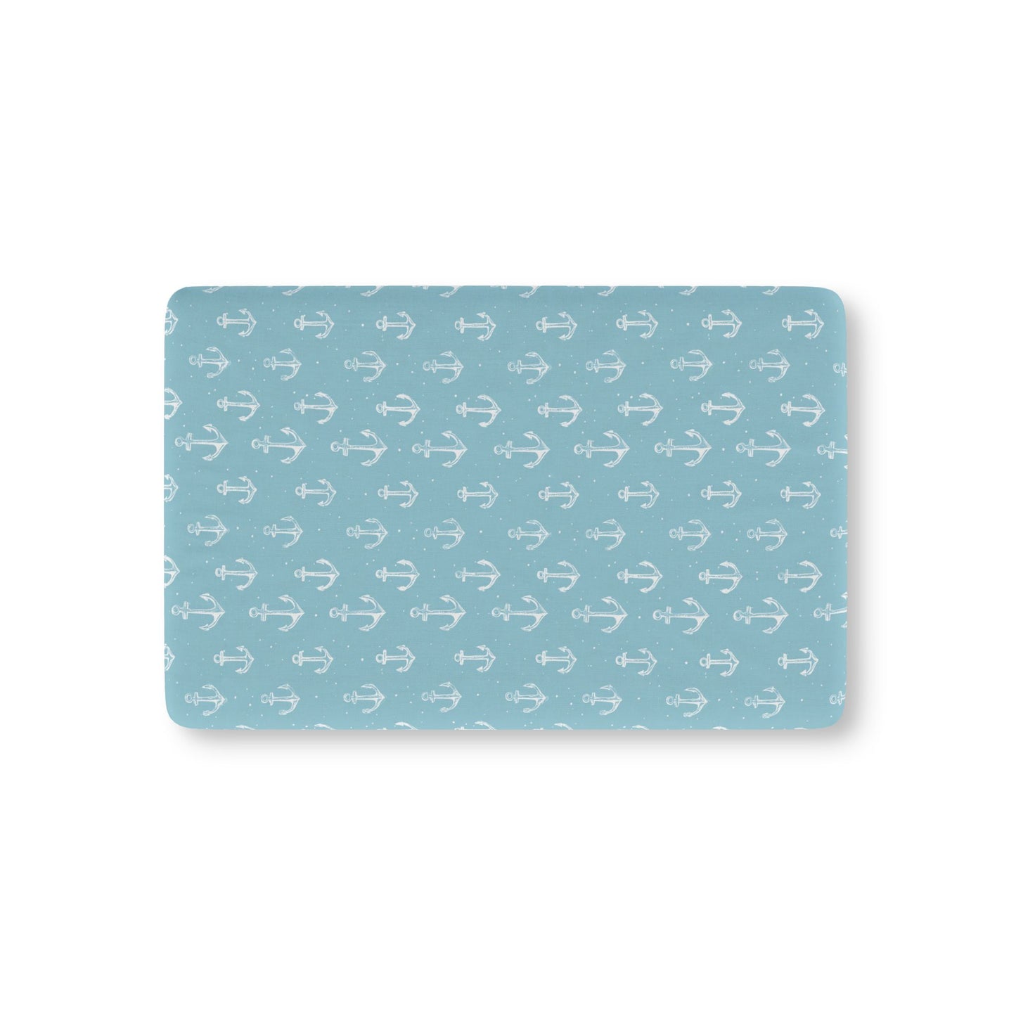 Nautical anchor fitted crib sheet on a nursery crib mattress