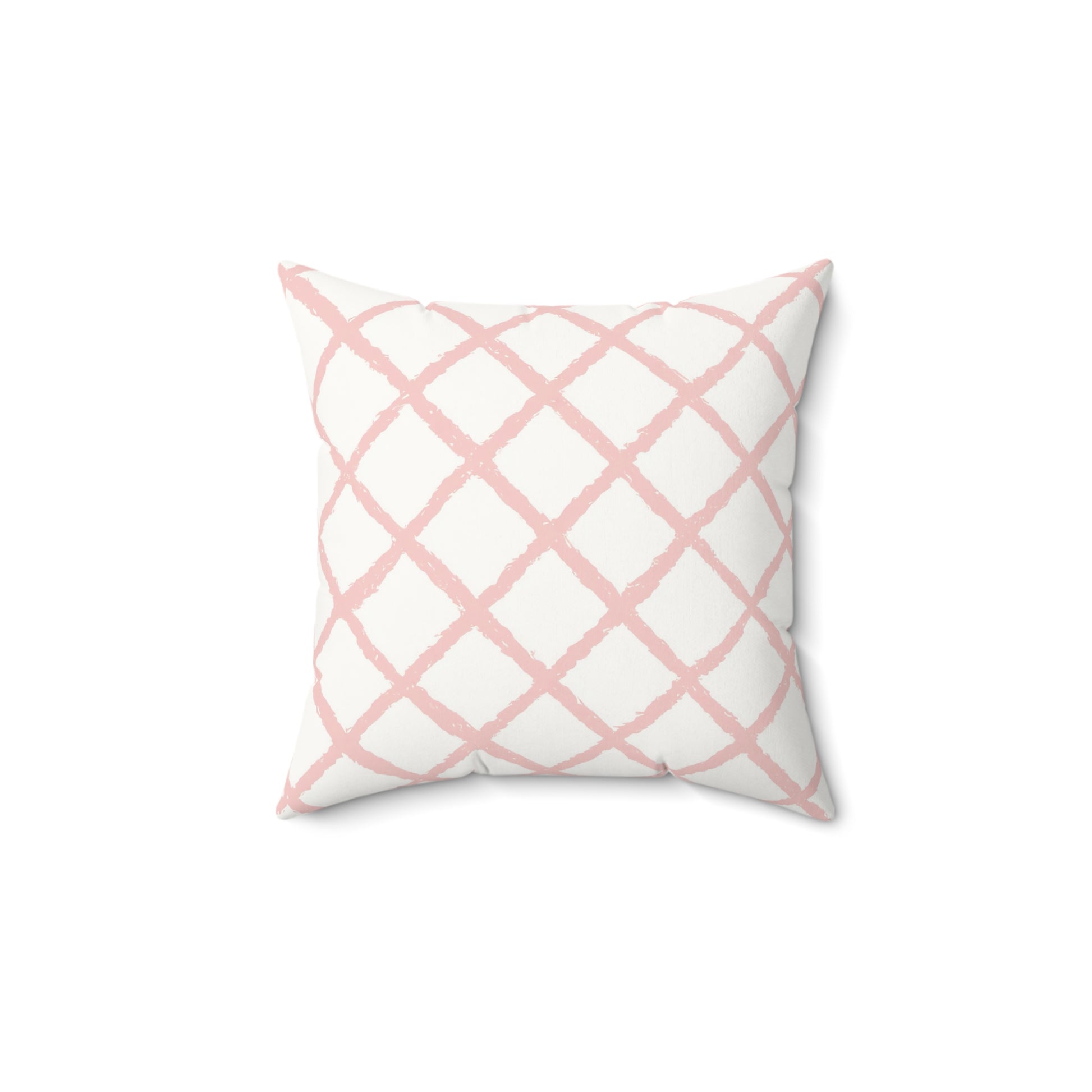 Pink trellis decorative nursery pillow on a glider chair