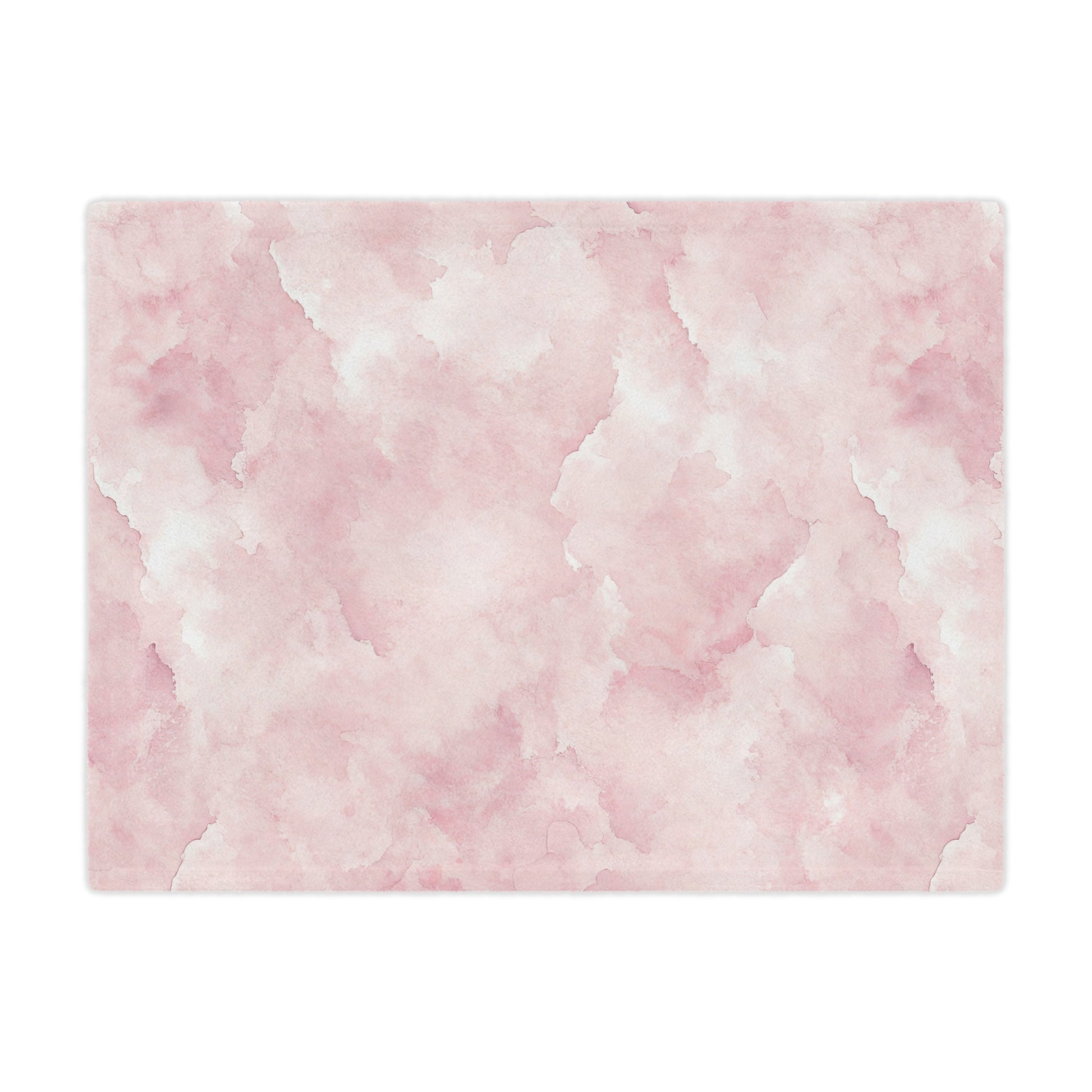Close-up of the plush minky texture on a pink watercolor baby blanket