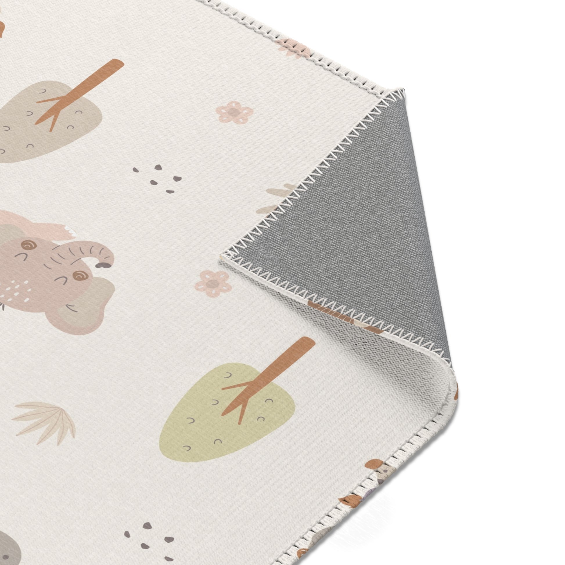 Sleepy safari area rug styled with nursery furniture