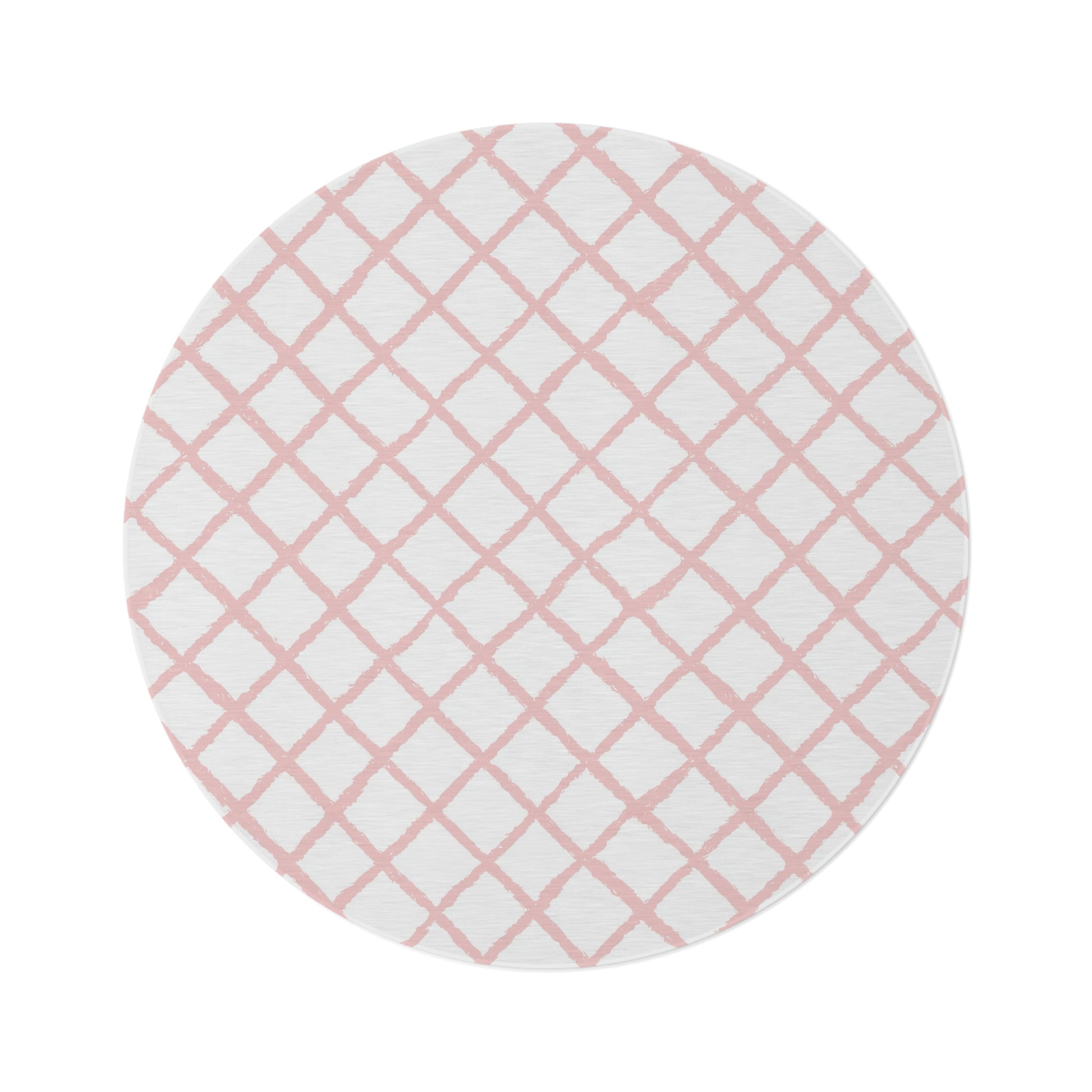 Pink trellis round nursery rug on a baby girl's bedroom floor