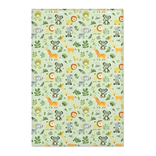 Jungle animal nursery area rug in a sage green baby room