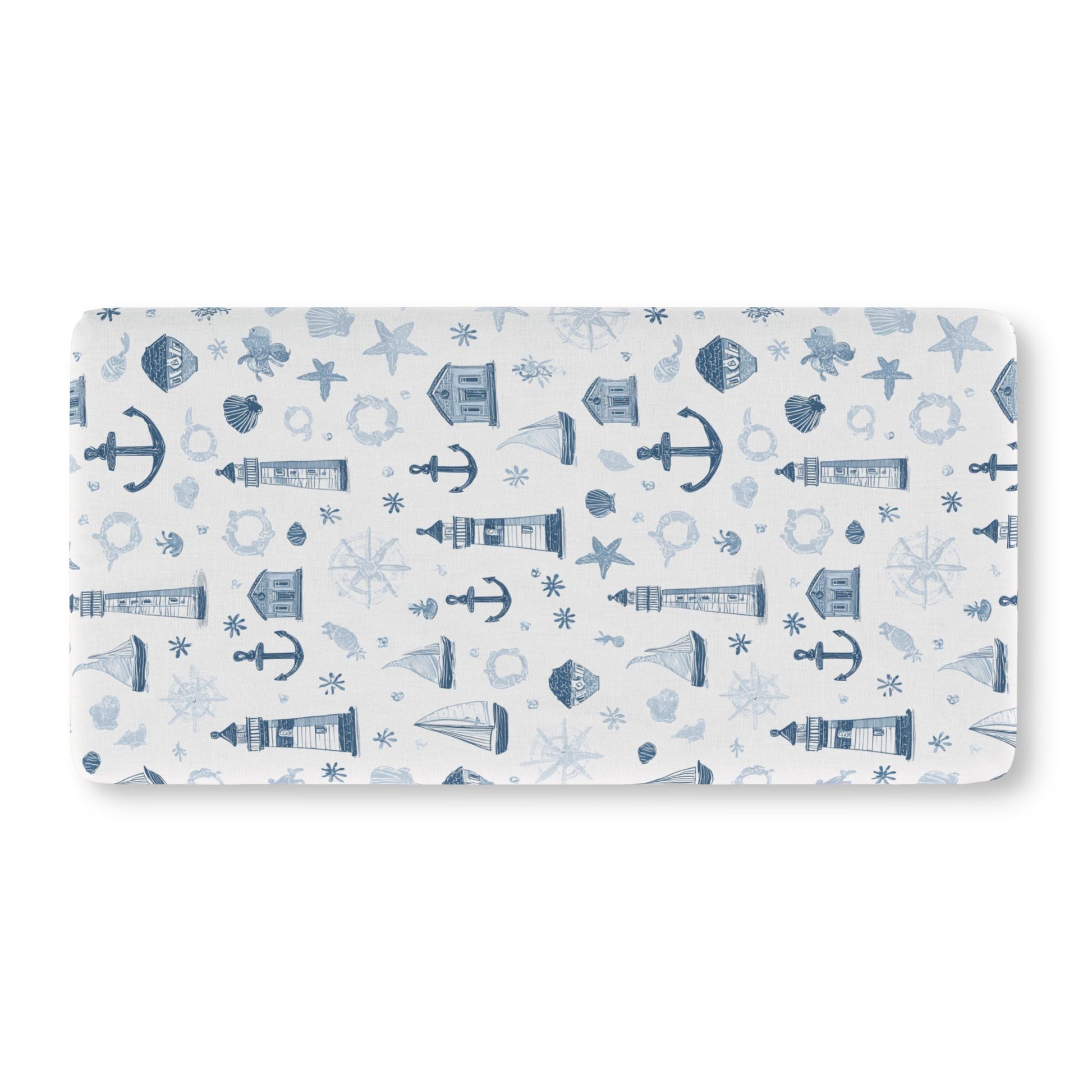 Navy nautical crib sheet showing the fitted elasticated corner