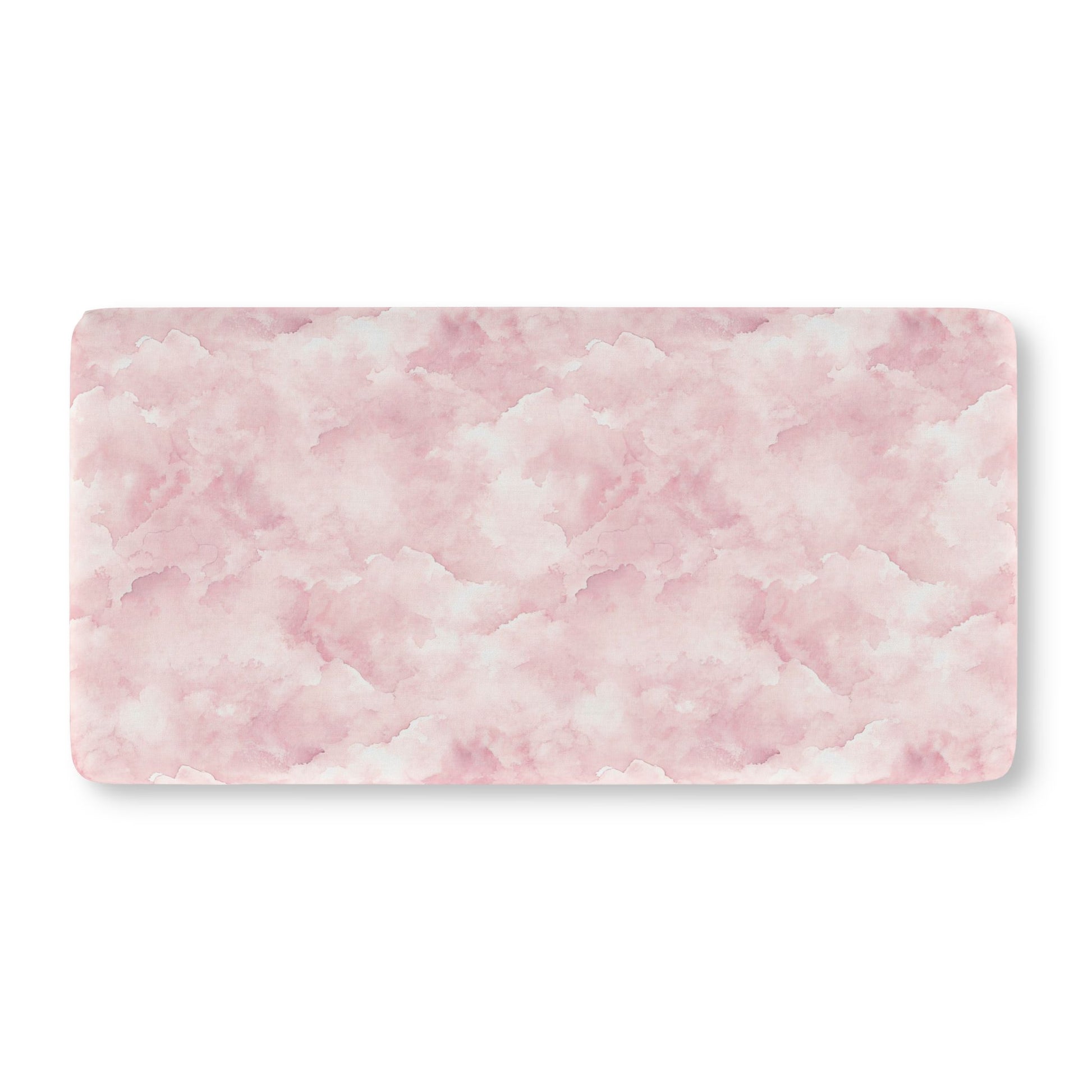 Soft pink cloud print crib sheet showing the fitted elasticated corner