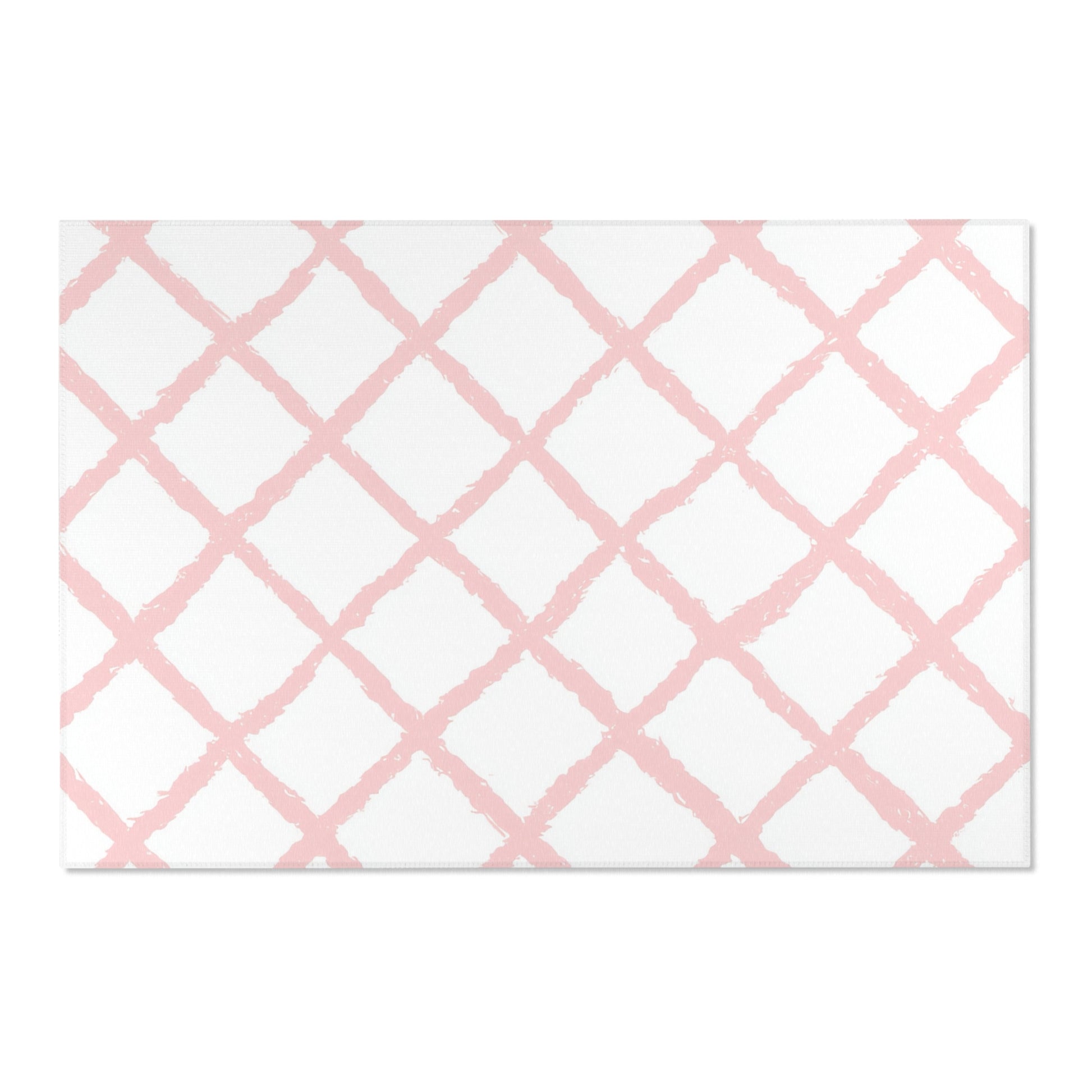 Corner detail of the pink trellis nursery rug