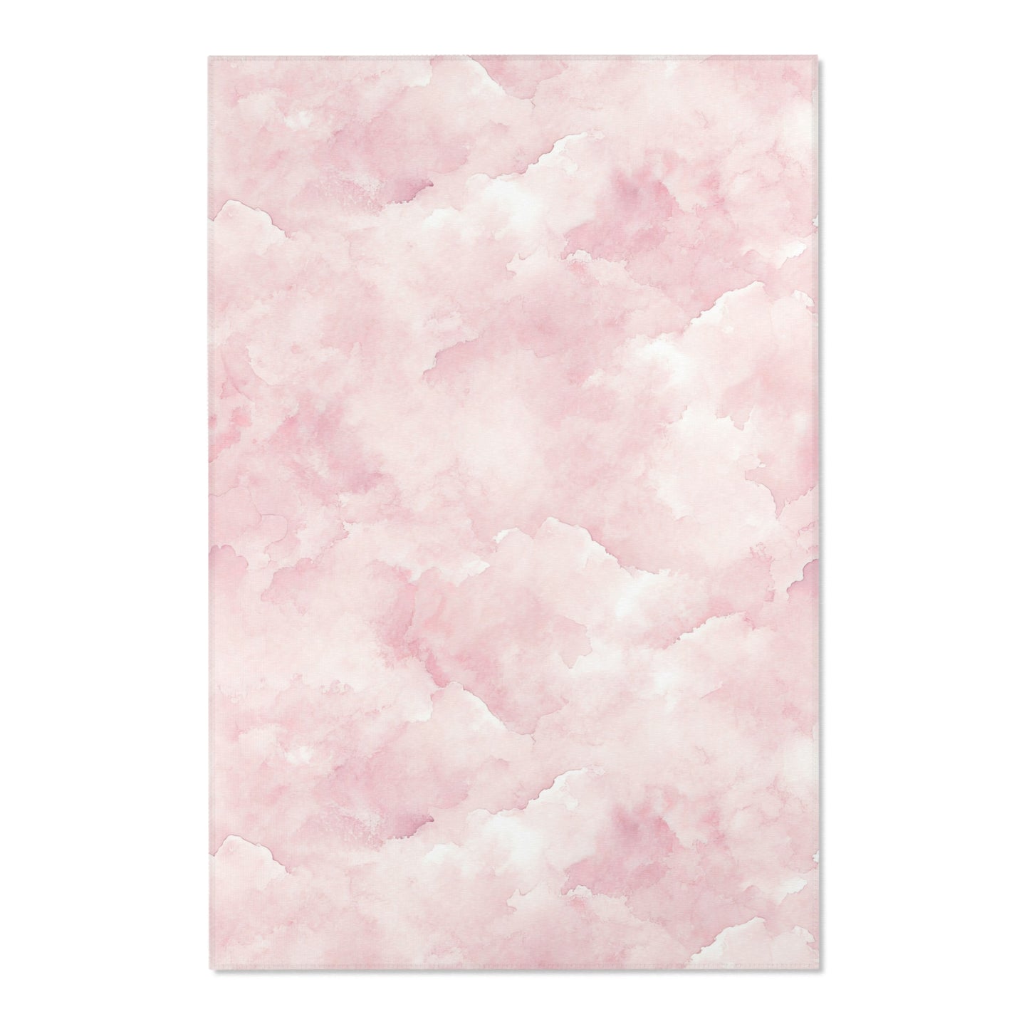 Close-up of the watercolor print on a pink nursery area rug
