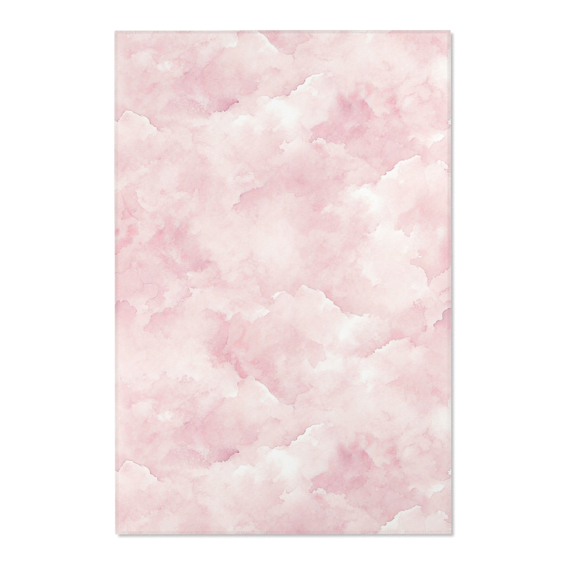 Close-up of the watercolor print on a pink nursery area rug