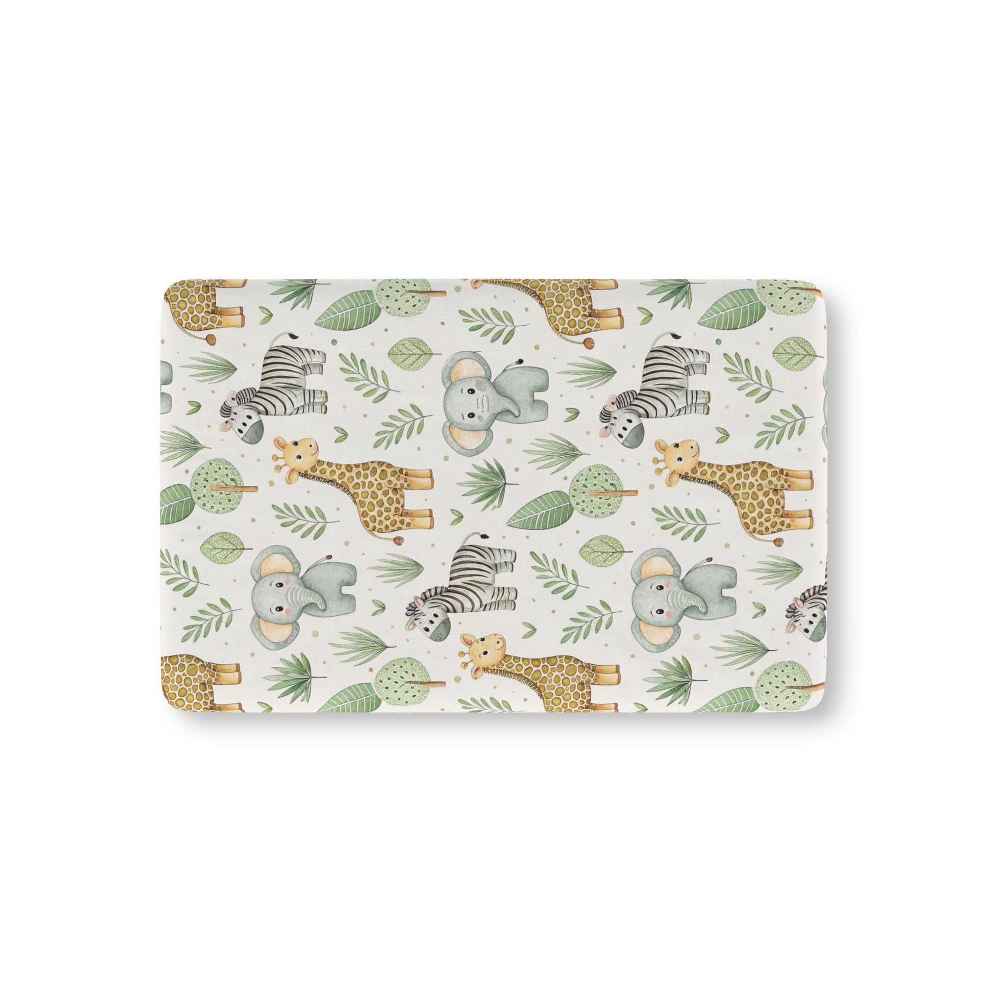 Safari animal fitted crib sheet on a nursery crib mattress