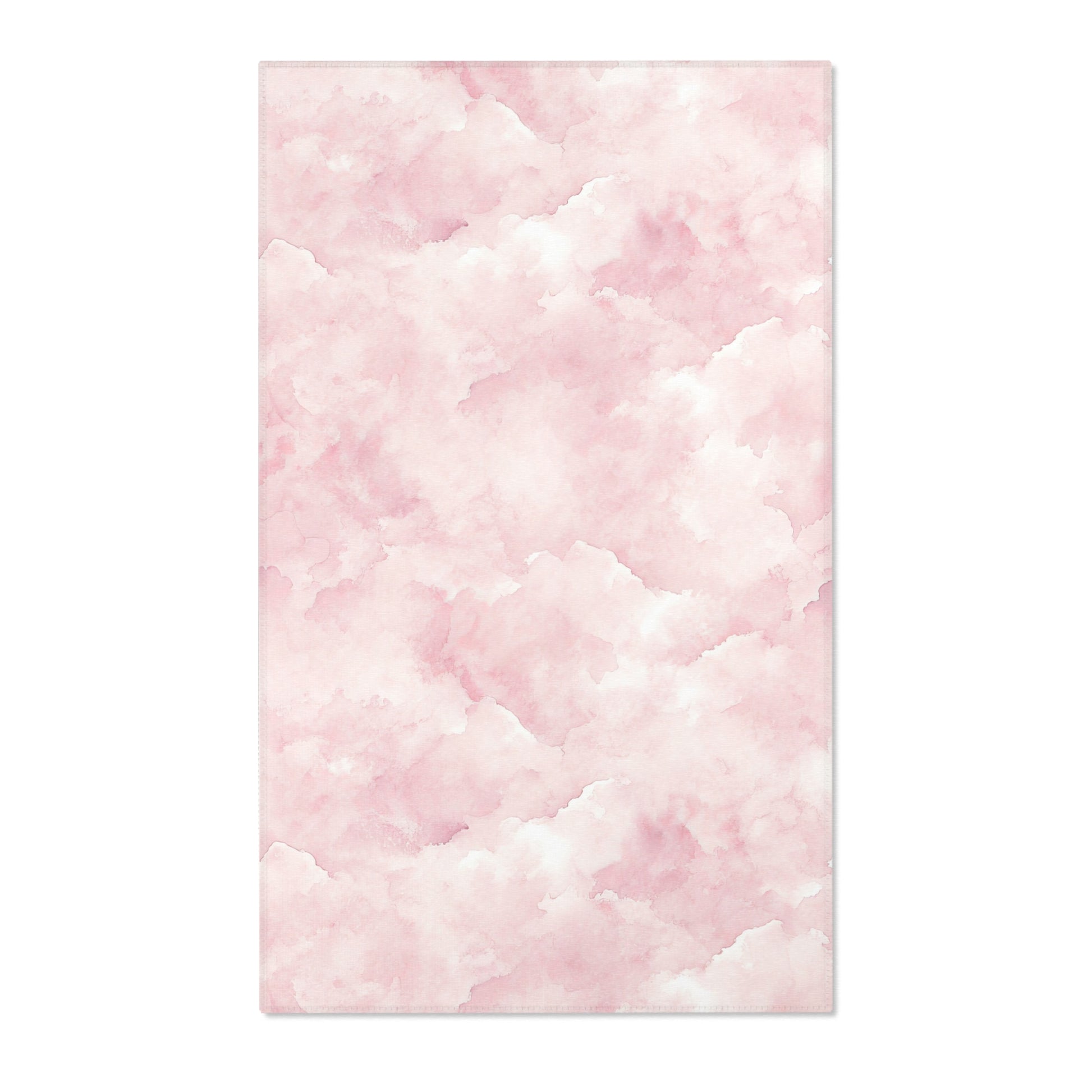 Rectangular pink cloud print nursery rug shown from above