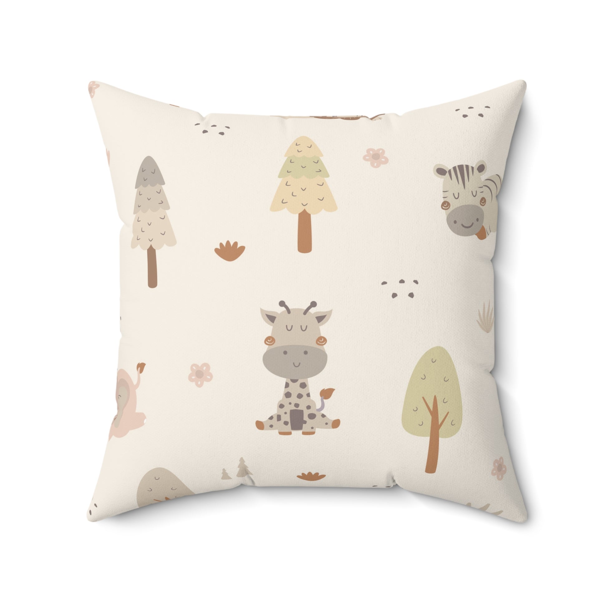 Cream safari print nursery pillow in a reading corner