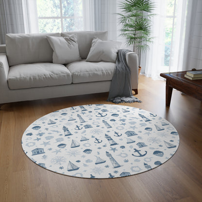 Nautical round rug styled under a nursery crib
