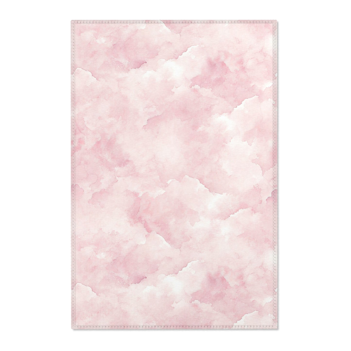 Pink watercolor clouds nursery area rug in a baby girl's bedroom