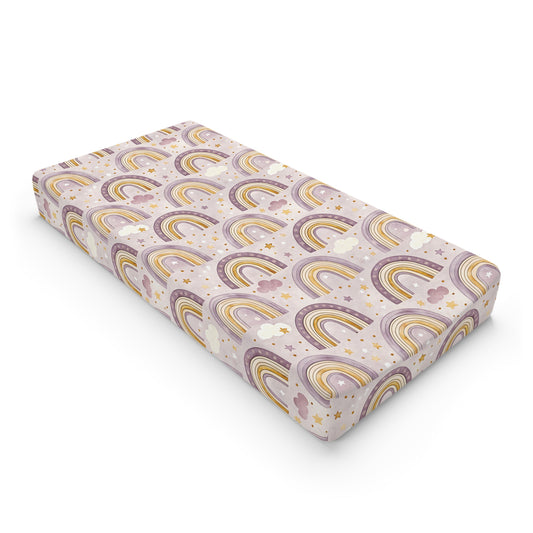 Amethyst Rainbows changing pad cover on a nursery changing table