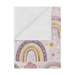 Amethyst Rainbows minky baby blanket draped over a crib