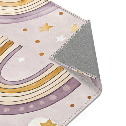 Purple rainbow rug in amethyst and gold for a nursery floor