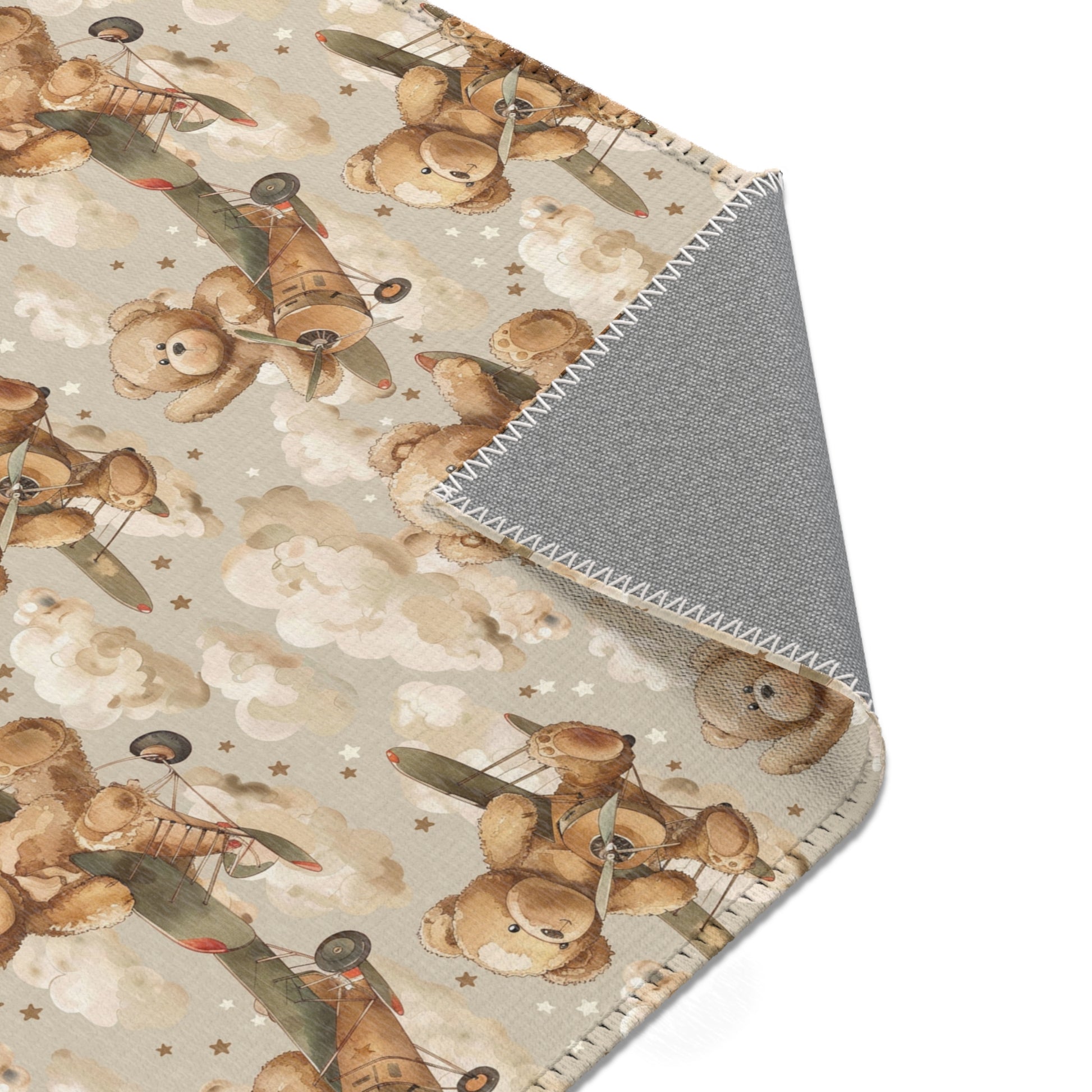 Nursery area rug printed edge to edge with bears and biplanes