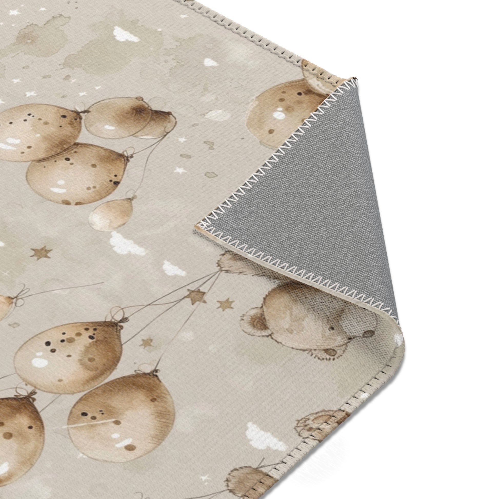 Teddy bear rug in taupe and sage for a nursery floor
