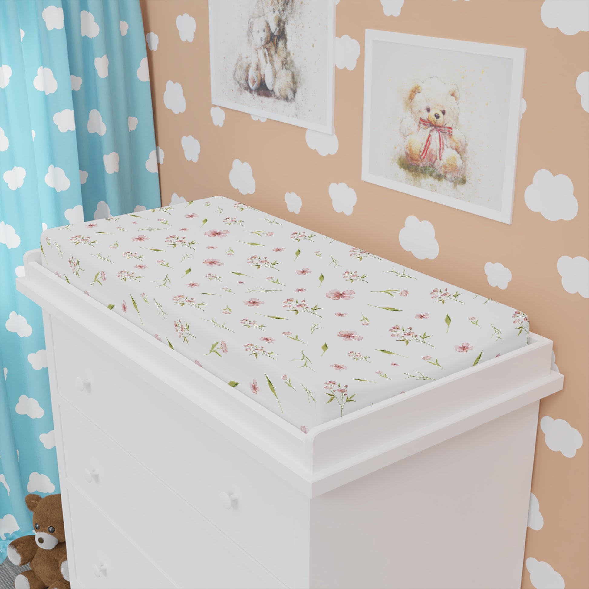 Pink floral changing pad cover matching the nursery crib sheet