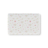 Blush Blossom fitted crib sheet on a nursery crib mattress