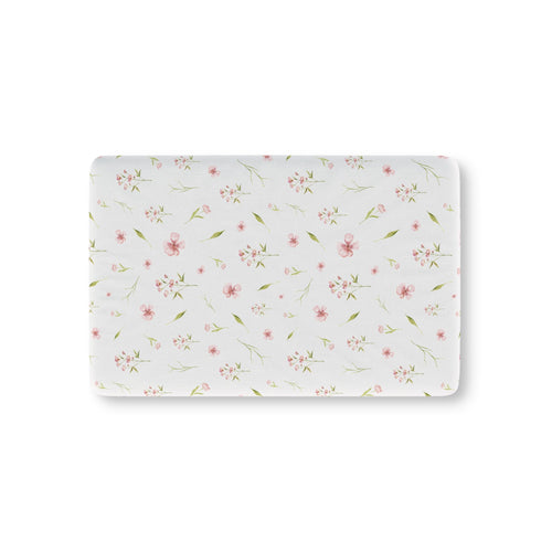 Blush Blossom fitted crib sheet on a nursery crib mattress
