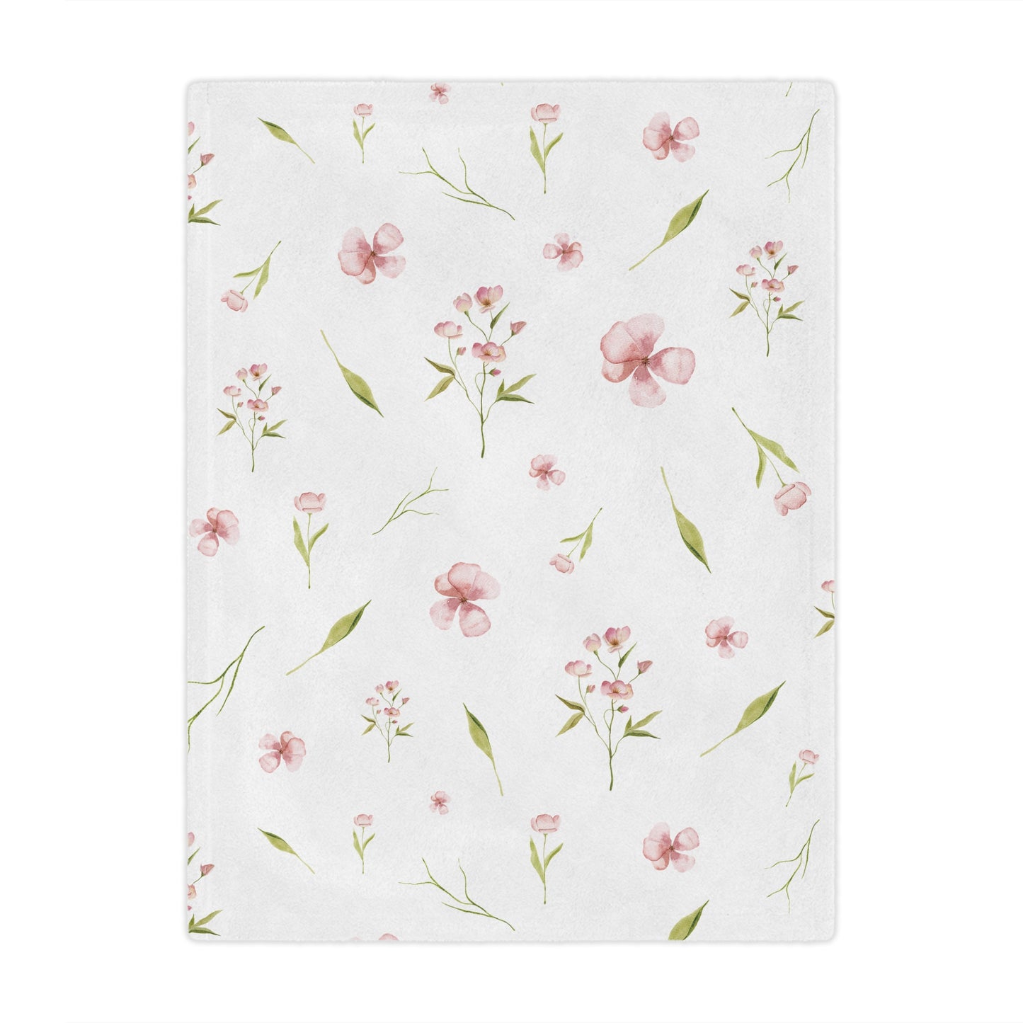 Pink watercolour floral minky baby blanket in a nursery