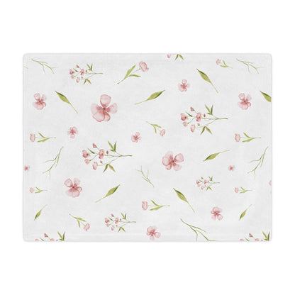 Soft minky blanket with dusty pink blooms and green leaves