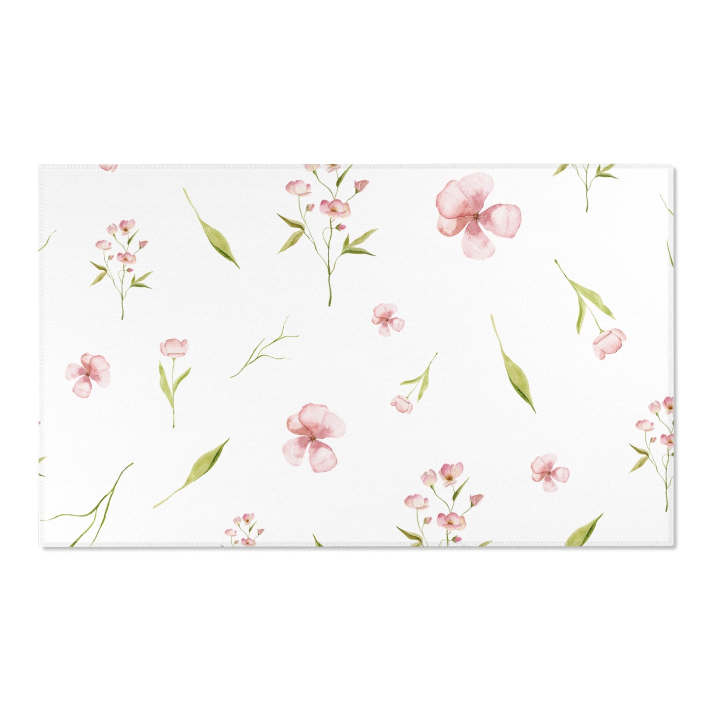 Watercolour floral area rug in a soft neutral baby room