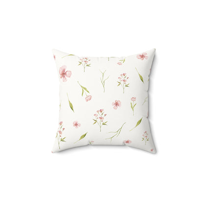 Blush Blossom decorative nursery pillow on a glider chair