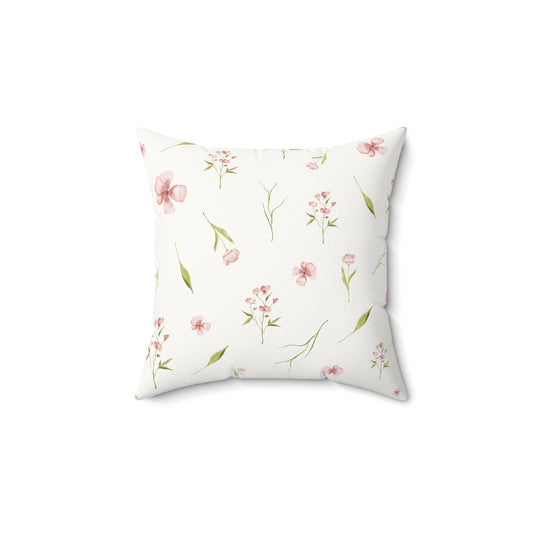 Blush Blossom decorative nursery pillow on a glider chair