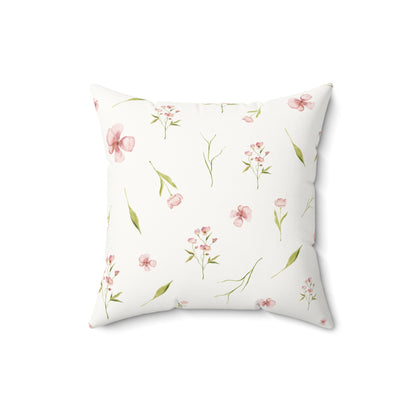 Pink floral faux suede nursery pillow with watercolour blooms