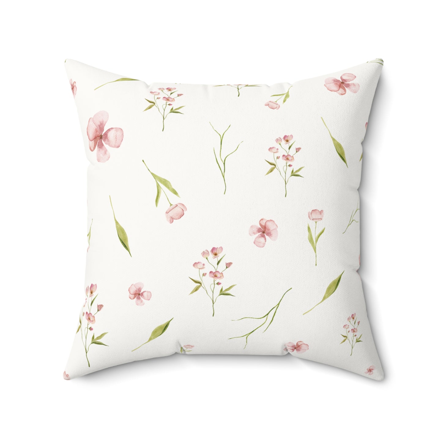 Dusty pink floral cushion on a nursery chair