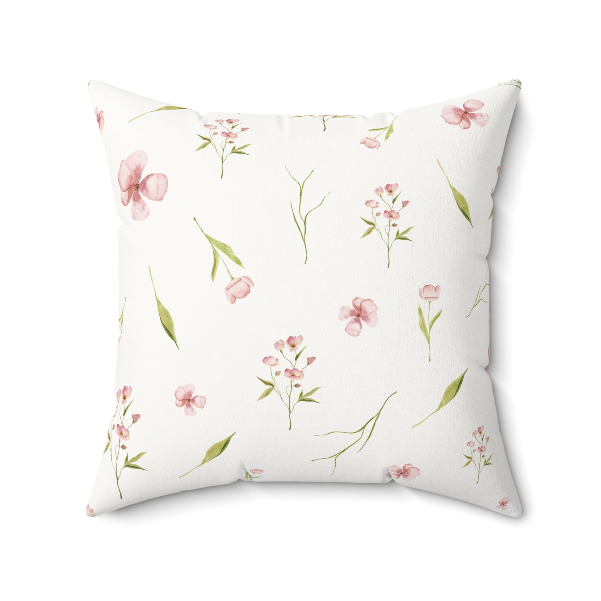 Dusty pink floral cushion on a nursery chair