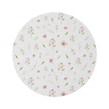 Blush Blossom round nursery rug on a baby girl's bedroom floor